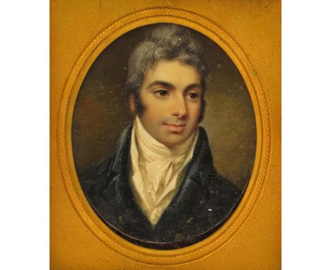λ H.V. (French 1806) Portrait miniature of a gentleman, bust length, in a blue coat and white stock Signed and dated 1806 Ova