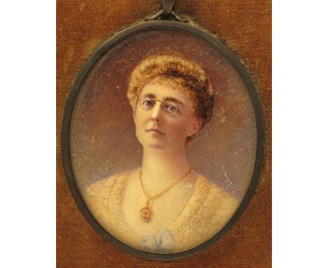 λ English School c.1900 Portrait miniatures of a lady and gentleman Both head and shoulders 73 x 62mm and similar With a furt