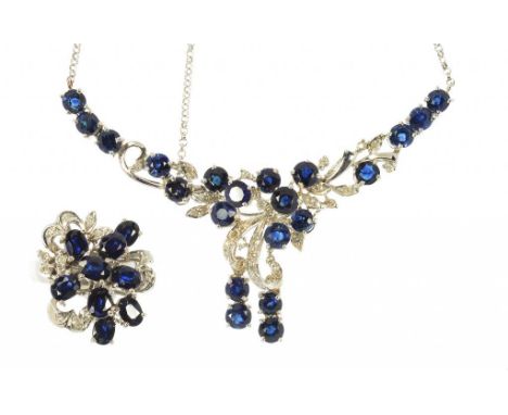 A SAPPHIRE AND DIAMOND SET WHITE GOLD NECKLACE, FULLY ARTICULATED AND A MATCHING RING, 16.2G