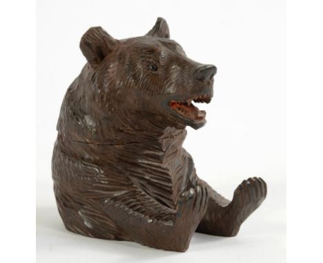 A SWISS 'BLACK FOREST' CARVED LIME WOOD BEAR NOVELTY INKWELL