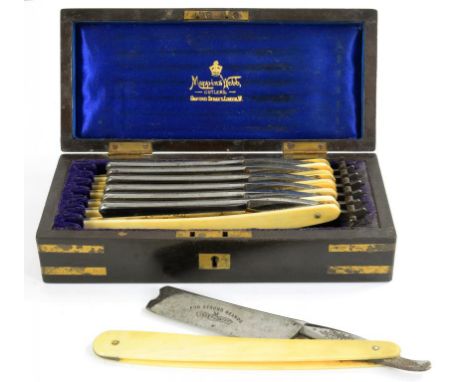 A SET OF SEVEN MAPPIN & WEBB RAZORS WITH BONE SCALES, ETCHED WITH THE DAYS OF THE WEEK, IN PLUSH LINED AND BRASS MOUNTED MARB