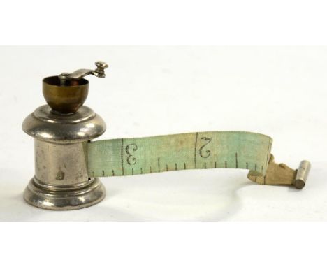 NEEDLEWORK TOOLS. A BRASS AND NICKEL PLATED COFFEE GRINDER NOVELTY TAPE MEASURE, 4CM H, LATE 19TH C