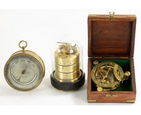 A VICTORIAN BRASS ANEROID BAROMETER, THE SILVERED REGISTER ENGRAVED SALOM & CO EDINBURGH & 137 REGENT ST LONDON 14680, WITH M