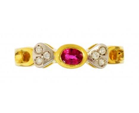 A RUBY AND DIAMOND THREE STONE RING  the larger oval ruby collet between triple diamond heart shaped shoulders, in gold marke