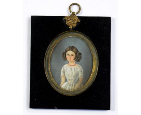 BRITISH SCHOOL, EARLY 19TH C, PORTRAIT MINIATURE OF A YOUNG GIRL, THREE QUARTER LENGTH IN A WHITE DRESS AND CORAL NECKLACE, I