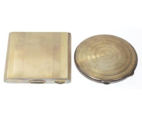 TWO SILVER COMPACTS, BOTH ENGINE TURNED