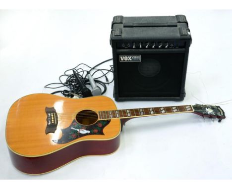 A MOUNTAIN GUITAR, TWO MICROPHONES AND A VOX VENUE LEAD 30 SPEAKER