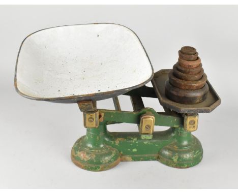 A Vintage Green Painted Cast Metal Based Pan Scale with Enamel Pan and Weights