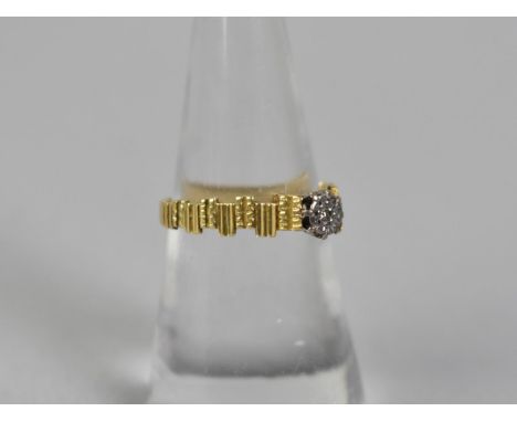 An 18ct Gold and Diamond Solitaire Ring, Round Cut Diamond Measuring 1.2mm Diameter, Illusion Set in White Metal to Textured 