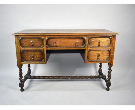 An Oak Kneehole Writing Desk with One Long Drawer and Two Short Drawers Either Side, Barley Twist Supports and Bobbin Stretch