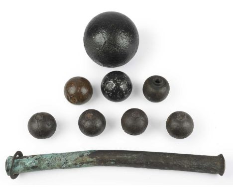 A small collection of 18th and 19th Century Royal Naval ordnance relics, comprising, a roved copper retaining bar and grape s