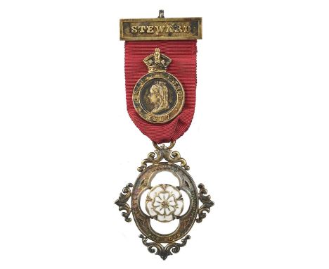 Freemasonry: a Royal Masonic Institute for Boys Steward's Jewel for the 1887 Jubilee, gilt and enamel, openwork oval with a w