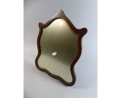 An Edwardian Mahogany Framed Easel Back Mirror of Shield Shape, 35cm high 