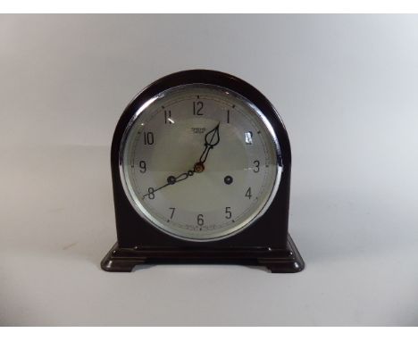 A Vintage Bakelite Mantle Clock by Smiths Enfield, 21cm high 