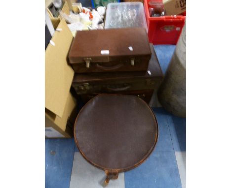 Three Vintage Suitcases and a Hat Box