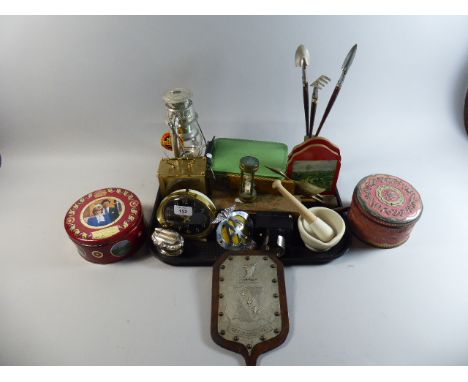 A Tray of Curios to Include AA Badge, Table Lighter, Alarm Clocks, Hurricane Lamp Etc 