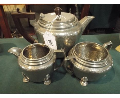 A Hammered Pewter Three Piece Tea Service 