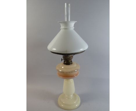 A Late Victorian Opaque Glass Oil Lamp with Narrow Chimney, 59cm high 