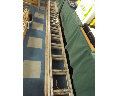 A Triple Extending Aluminium Ladder Together with Stand off Bracket 