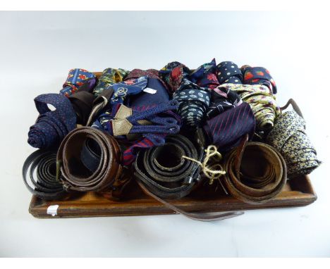 An Edwardian Tray Containing Various Silk Ties and Vintage Belts 