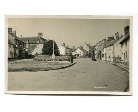 A collection of approximately 100 postcards of Somerset, including photographic postcards titled 'Stogursey', 'Market Cross, 