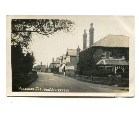 A collection of approximately 570 postcards in three albums and loose, the majority British topographical views and social hi