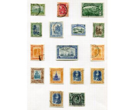 A collection of stamps on album leaves with mostly British Commonwealth, Bermuda 1920 1sh used, Bahrain 1955 high values mint