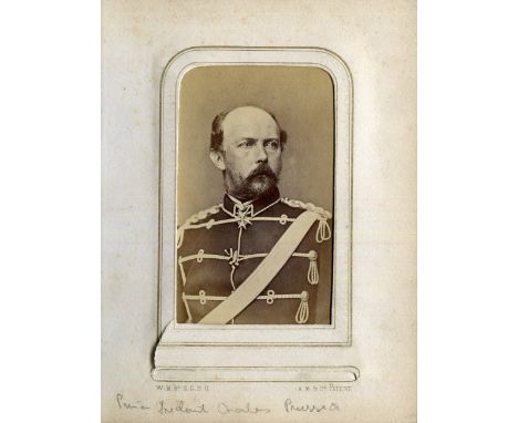 PHOTOGRAPHS. Two albums containing 64 cartes-de-visite photographs, the majority Royal portraits, including Sultan Abdulaziz,