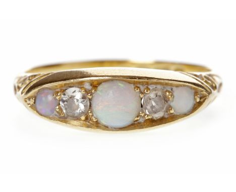 VICTORIAN EIGHTEEN CARAT GOLD OPAL AND DIAMOND RINGwith a boat shaped bezel set with three round opals interspaced by two old