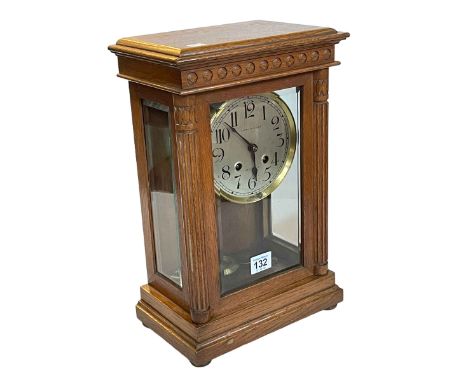Vintage oak bracket clock with silver dial marked Harrison & Son, Darlington, 36cm.