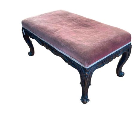 Large Victorian carved mahogany stool on cabriole legs, 43cm by 89cm by 52cm.