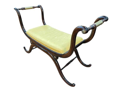 Regency style scrolling X-framed stool, 68cm by 105cm by 42cm.