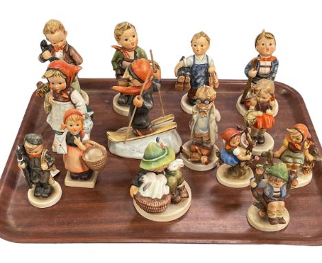 Collection of fourteen Hummel figures.