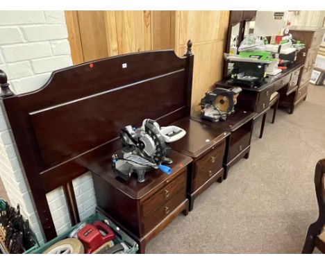 Stag Minstrel seven piece bedroom suite comprising triple mirror dressing table, seven drawer chest, pair two drawer pedestal