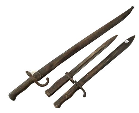 Three bayonets including R Stock & Co, Berlin.