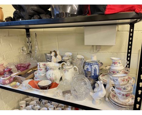 Glass decanters, scent bottles, Picquot tea set, Nao Geese, tea china, cutlery, three table lamps, etc.