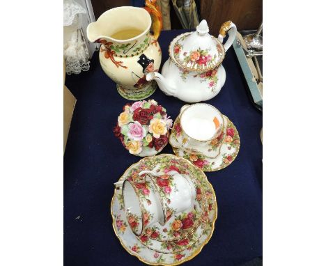 ROYAL ALBERT OLD COUNTRY ROSES PART TEA SERVICE, Crown Devon Fieldings John Peel MUSICAL JUG, and a china posyProvenance: pri