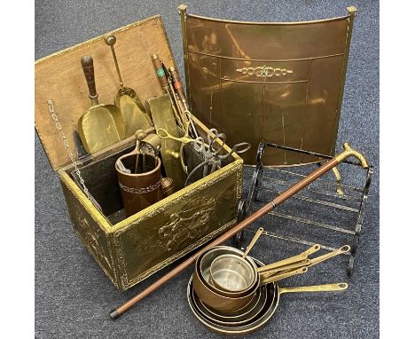 ASSORTED METALWARE, including vintage copper and brass fireguard, graduated set of copper and brass cooking pans, embossed br