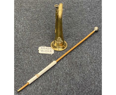 EARLY 19TH CENTURY ROYAL ARTILLERY BRASS BUGLE, with applied crest, and a Malacca swagger stick, nickel pommel with Royal Wel