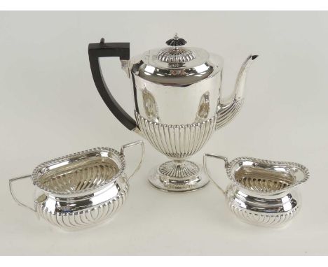 VICTORIAN SILVER PEDESTAL COFFEE POT, by Charles Boyton & Son, London 1894, with ebony handle and finial, 24.5cm (h), also a 