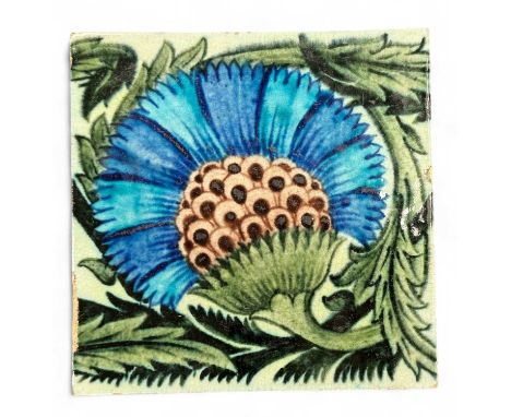 WILLIAM DE MORGAN (1839-1917) DECORATED CERAMIC TILE, detailed with a Persian carnation in blues and greens, indistinct proba