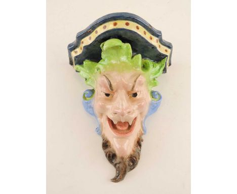 ITALIAN MAIOLICA BACCHANALIAN MASK WALL BRACKET, crowned Naples mark to reverse, 24cms (h)Provenance: private collection Flin