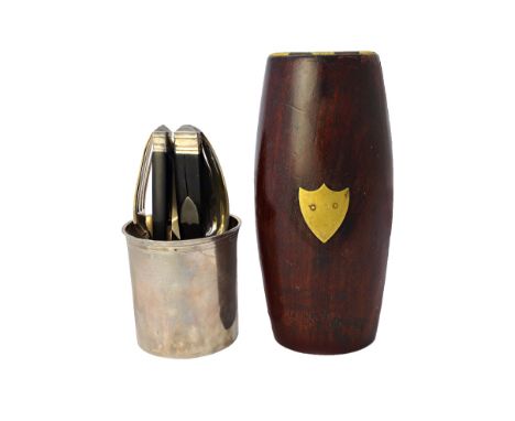 A French campaign travelling cutlery set, early 19th century, the mahogany and brass inset barrel form case enclosing a singl