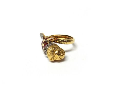 A gold, rose diamond set and red enamelled ring, in a coiled design, terminating as a lion's head, the collar and the tail en