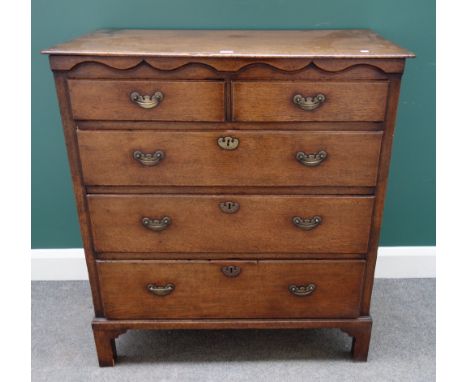 An 18th century oak chest of two short and three long graduated drawers, on bracket feet, 93cm wide x 48cm deep.
