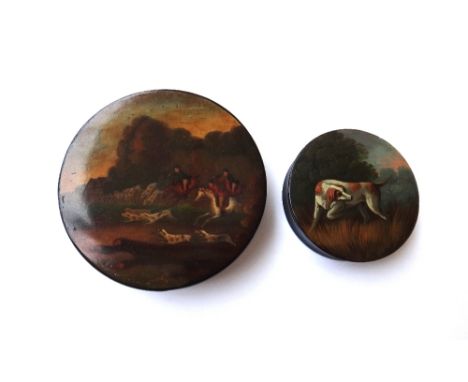 A Stobwasser type circular papier mache snuff box and cover, 19th century, depicting a hound against a landscape, 8.5cm diame