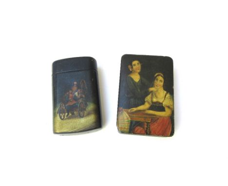 A Russian papier mache cigarette case, late 19th century, with hinged lid, decorated with a Troika scene and with printed mak