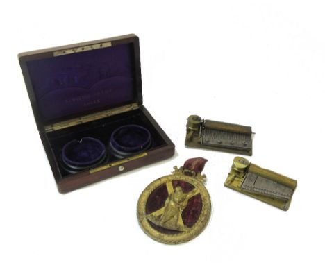 A rosewood and metal inlaid box, the velvet lined interior and with two pocket watch/barometer recesses, gilt lettered 'E. BO