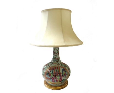 A Chinese Canton porcelain table lamp vase, 19th century, of bottle neck form, on a gilt wood circular base with octagonal sh