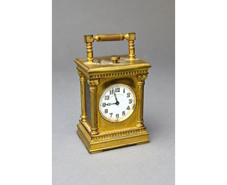 An unusual French gilt metal miniature minute repeating carriage timepieceCirca 1910, No. 257125The multipiece case of archit